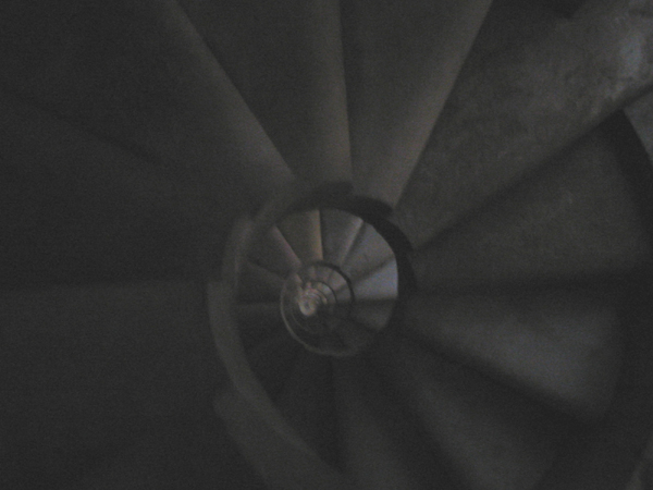 another dark shot looking down spiral staircase of tower at sagrada familia_edited